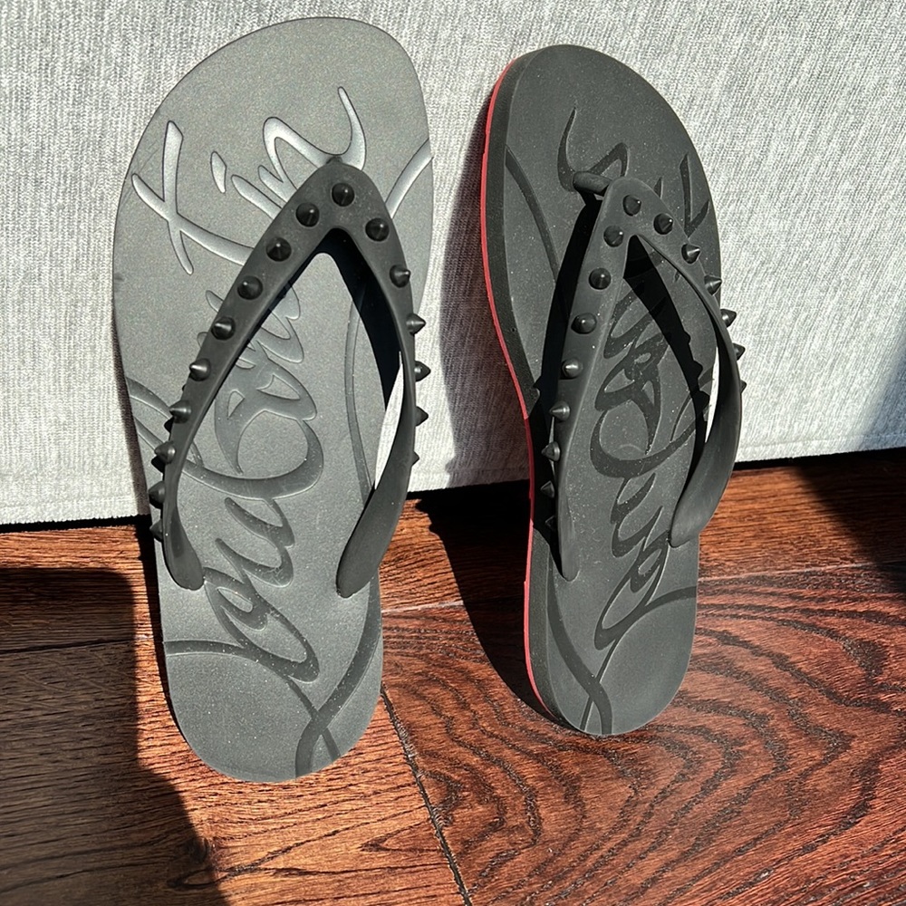 Christian Louboutin flip-flops never worn